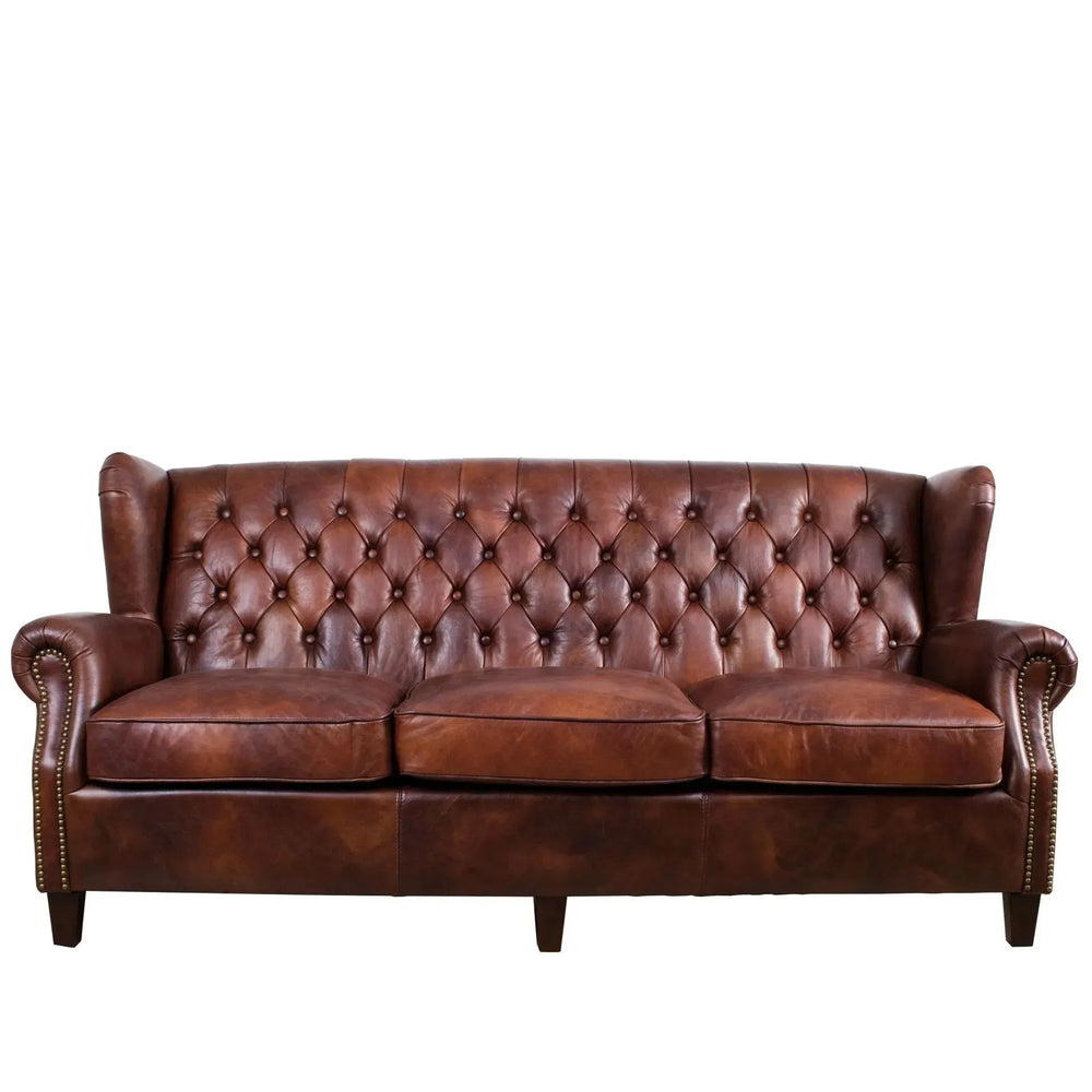 Vintage genuine leather 3 seater sofa franco in white background.