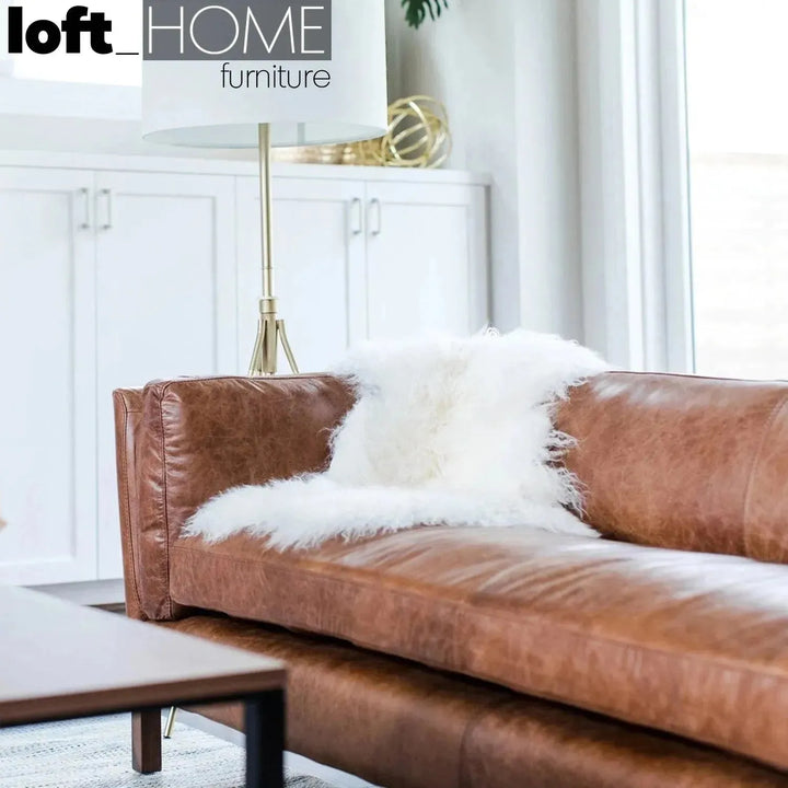 Vintage genuine leather 4 seater sofa reggio with context.
