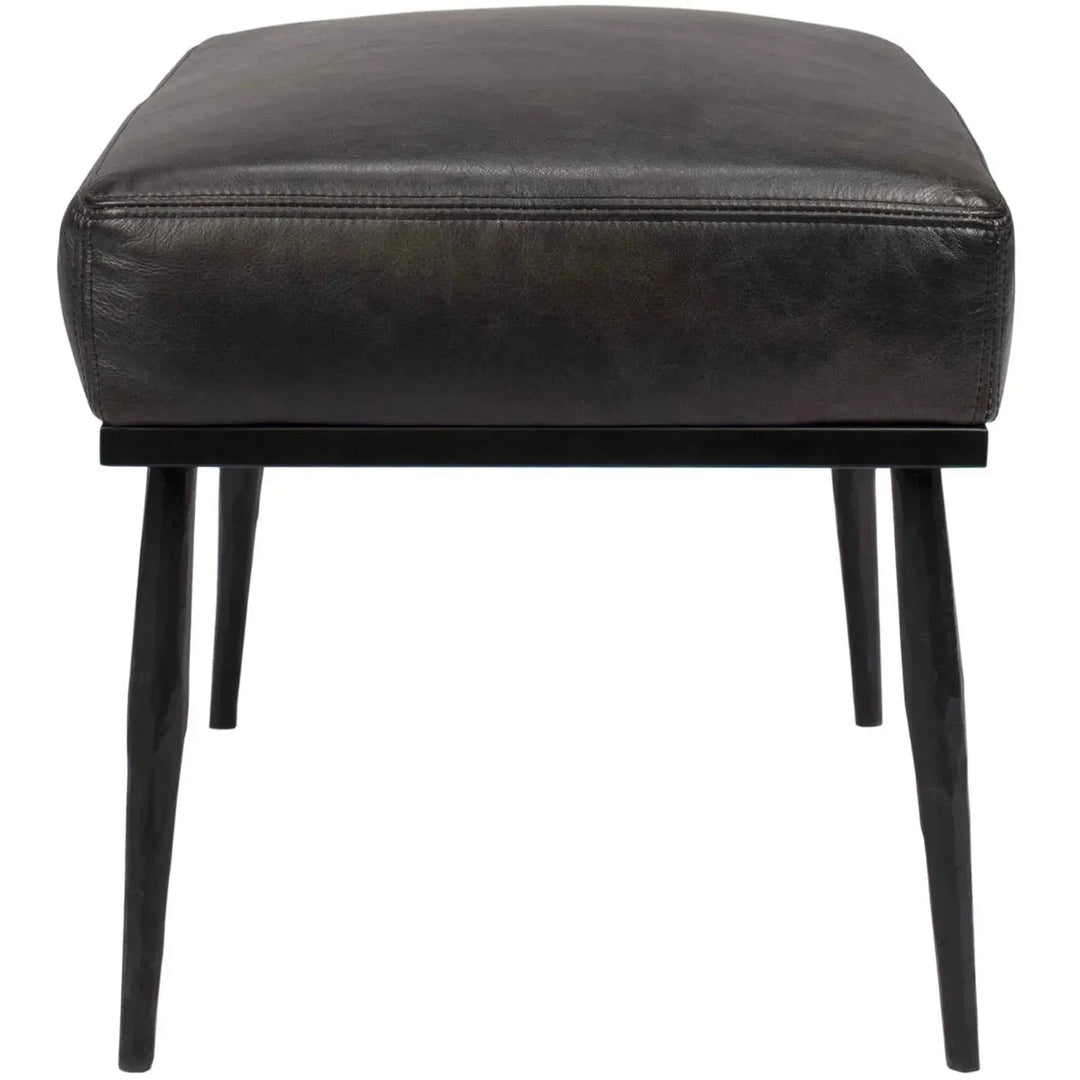 Vintage genuine leather ottoman hummer brass in close up details.