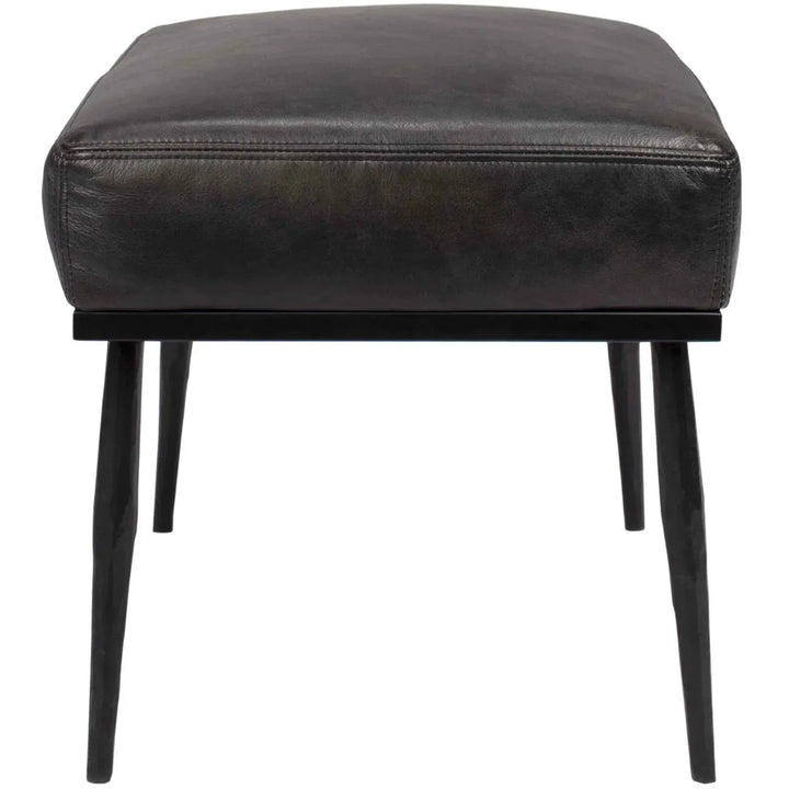 Vintage genuine leather ottoman hummer brass in close up details.