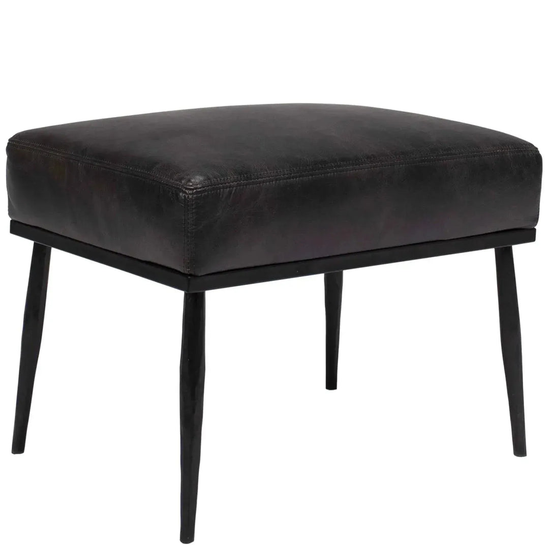 Vintage genuine leather ottoman hummer brass in details.
