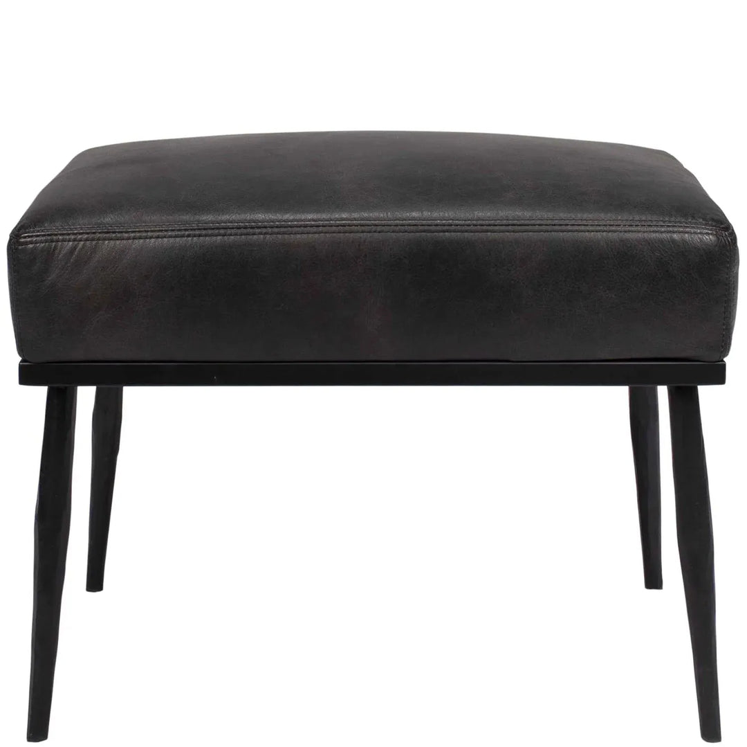 Vintage genuine leather ottoman hummer brass with context.