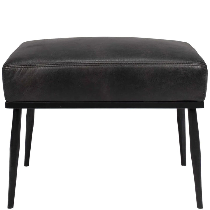 Vintage genuine leather ottoman hummer brass with context.