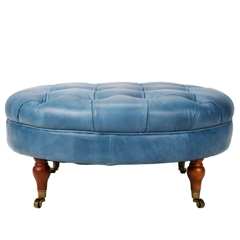 Vintage genuine leather ottoman sand in white background.