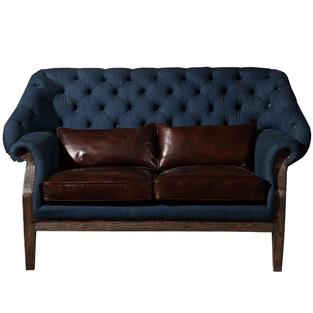 Vintage jeans fabric and genuine leather 2 seater sofa cowboy in white background.