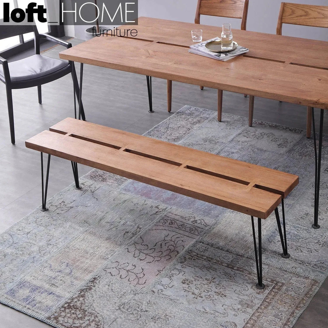 Industrial rubber wood dining table dovetail in panoramic view.