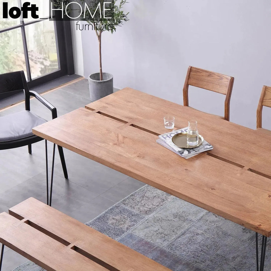 Industrial rubber wood dining table dovetail in real life style.