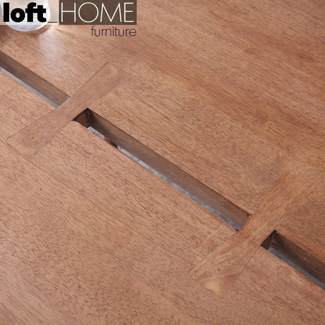 Industrial rubber wood dining table dovetail in close up details.