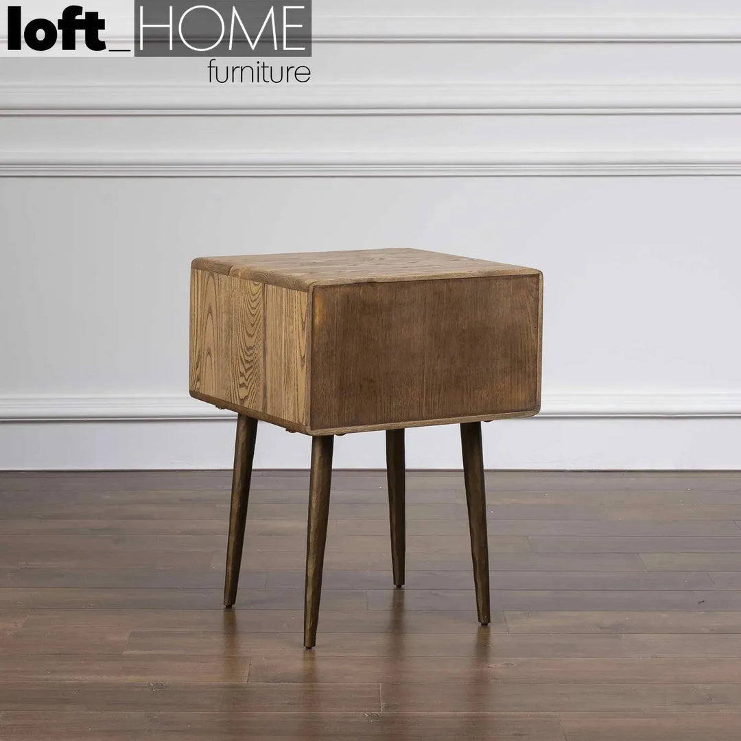 Vintage wooden side table hammer brass in real life style.