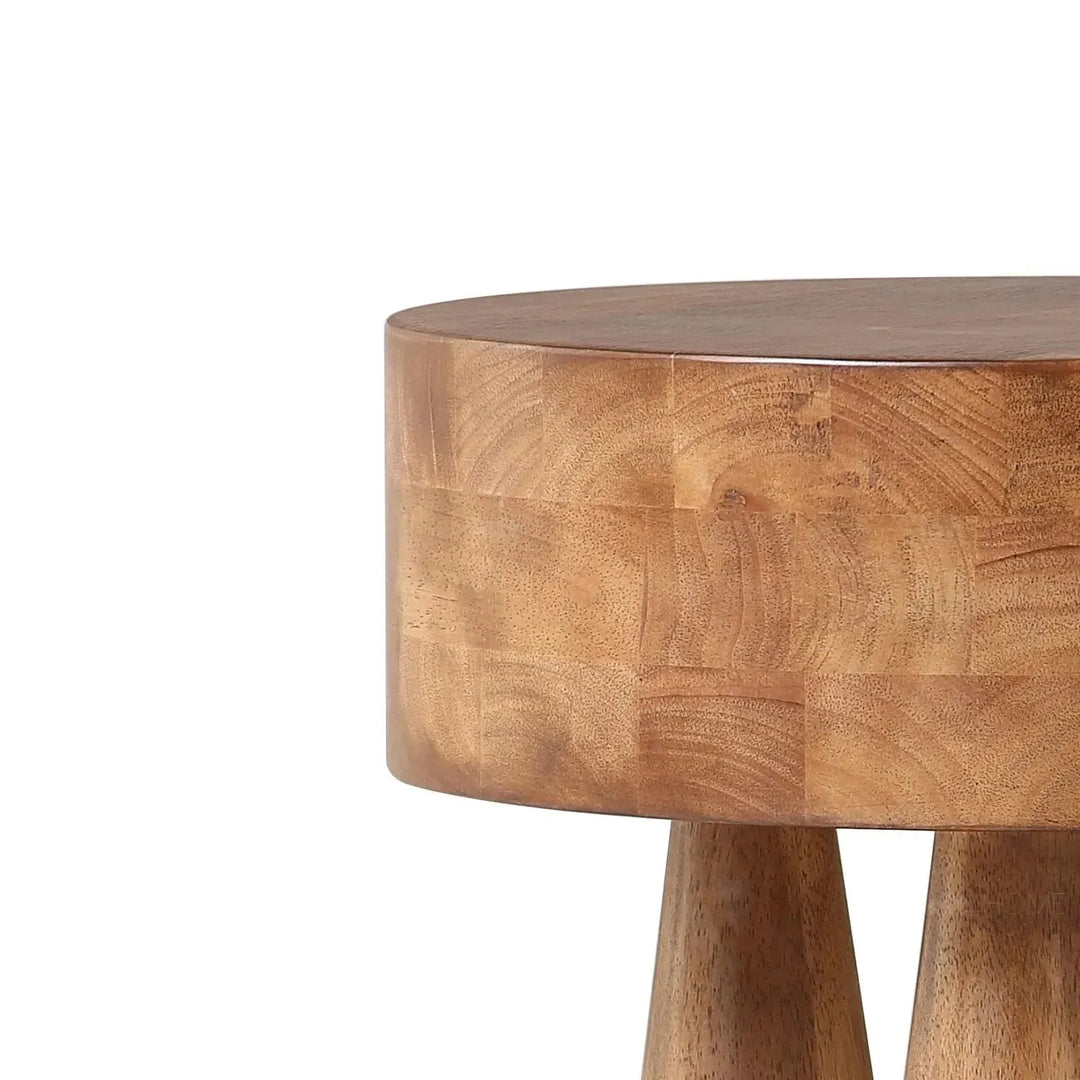 Rustic wooden side table stumpy in close up details.