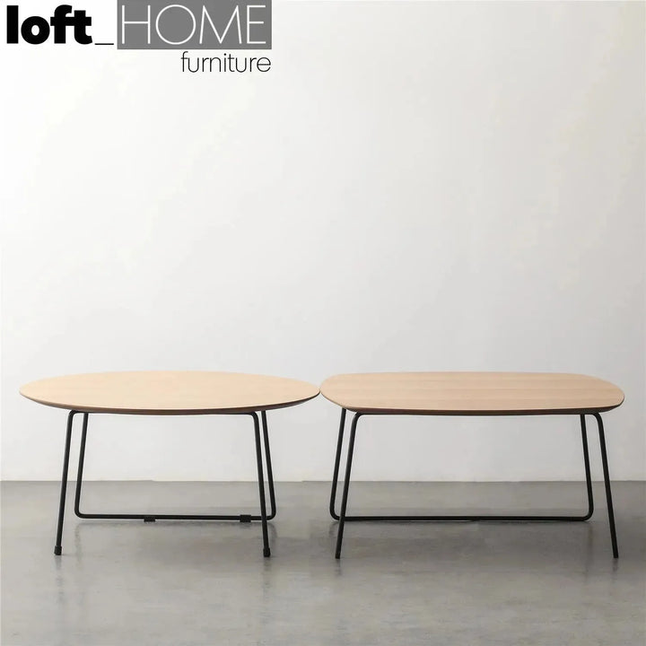 Industrial wood coffee table carlos round in still life.