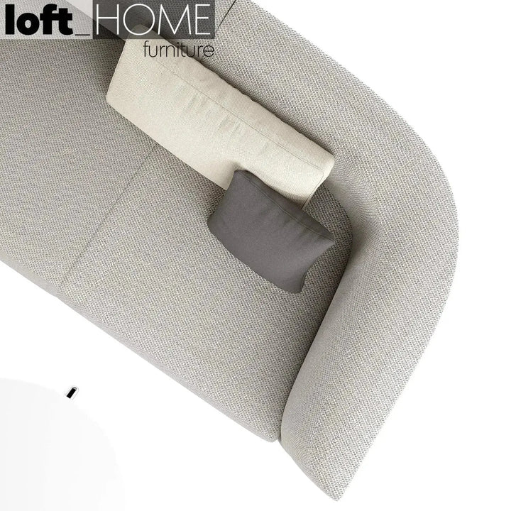 Minimalist fabric 2 seater sofa low back kas in still life.