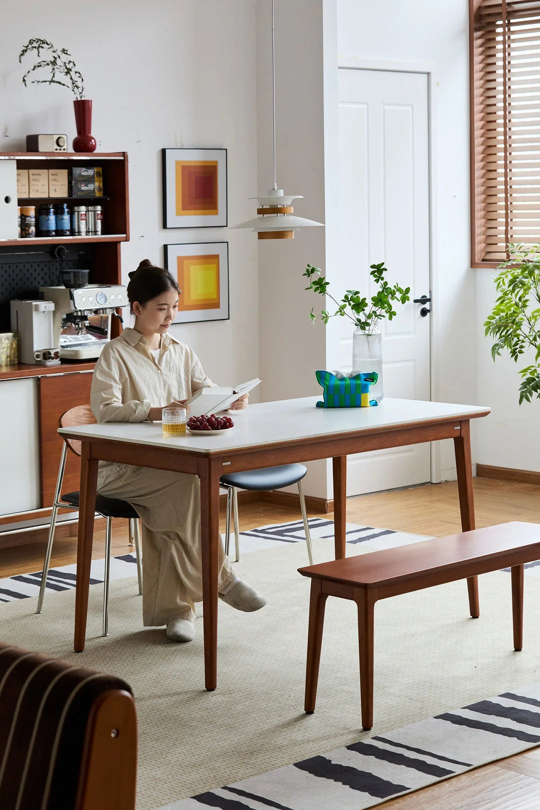 Modern wooden dining table with clean lines, styled in a bright contemporary dining space, offering practical everyday use for Singapore homes.