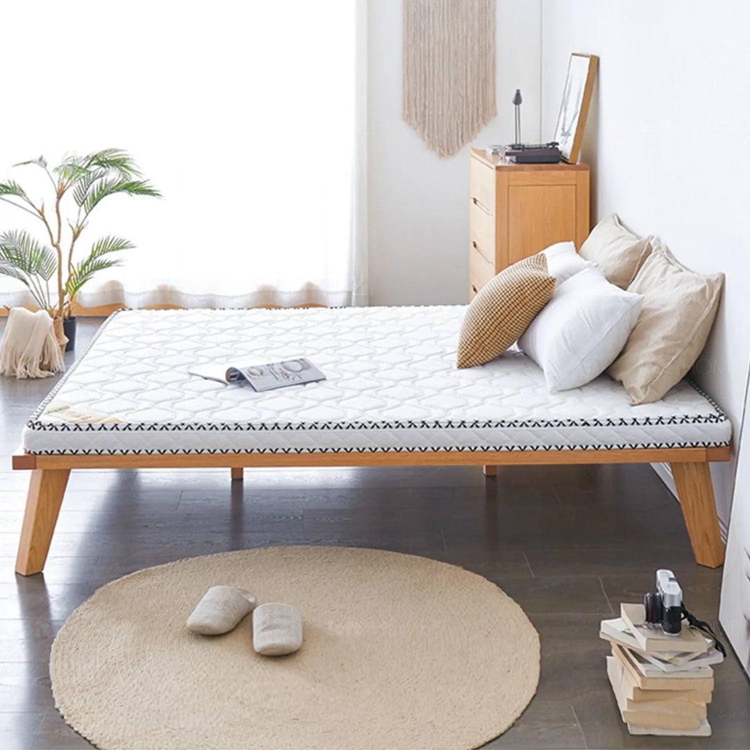 LoftHome Asia single mattress featuring sleek grey fabric, firm support, and a cozy design, perfect for compact bedrooms.