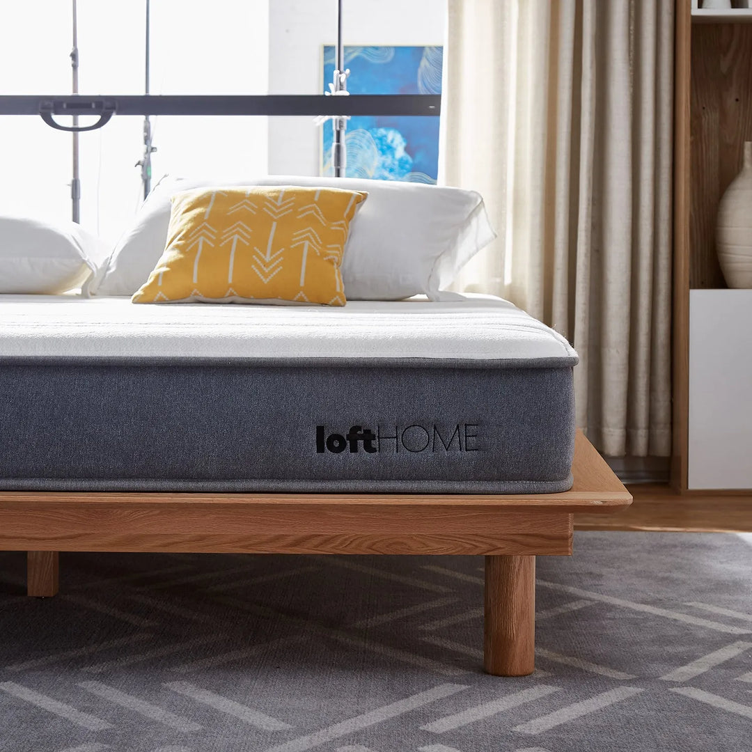 Modern bedroom with an Asia super single mattress on a wooden frame. Explore the Asia super single mattress collection at Loft Home Furniture.