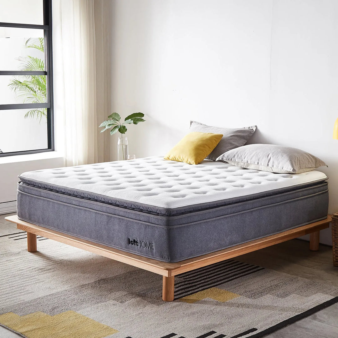 Modern bedroom with an Asia king-size mattress on a wooden bed frame. Explore the Asia king-size mattress collection at Loft Home Furniture.