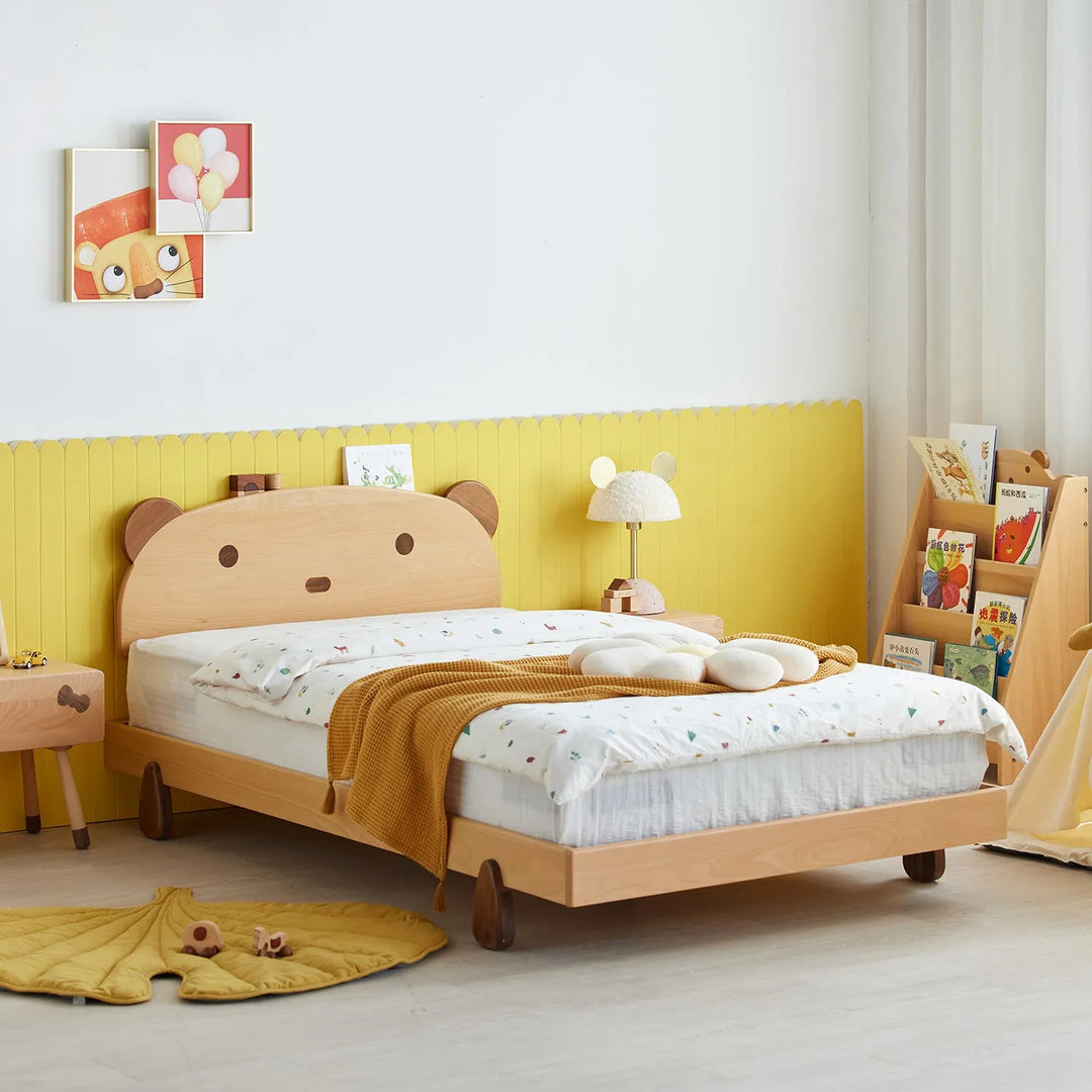 Cheerful children's bedroom featuring a wooden bed with a cute bear headboard, playful decor, and vibrant yellow accents, linking to Loft Home's kid bed collection.