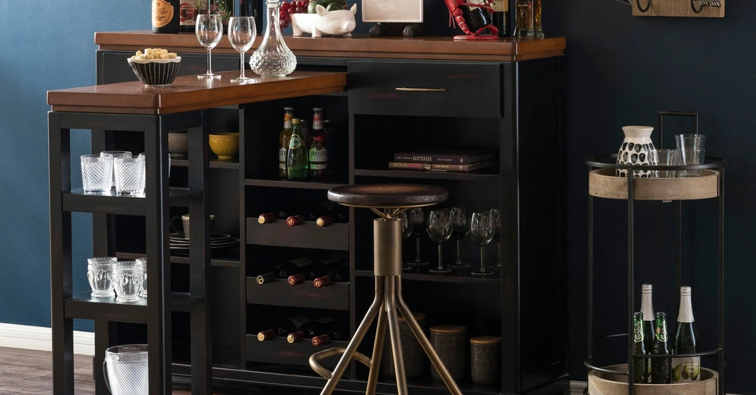 Modern bar table with built-in shelves, set in a bright room with wooden blinds and a cozy sofa, featuring a person working on a laptop while enjoying a drink.