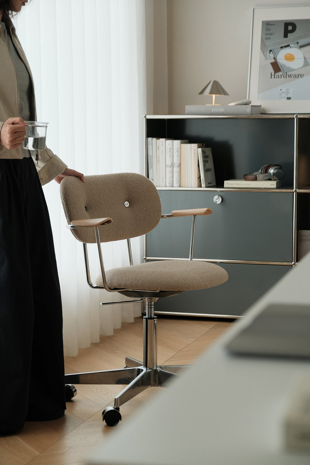 Bauhaus-inspired chair with curved wood arms and fabric seat, styled for Singapore home offices, study corners, condos, and HDB flats.