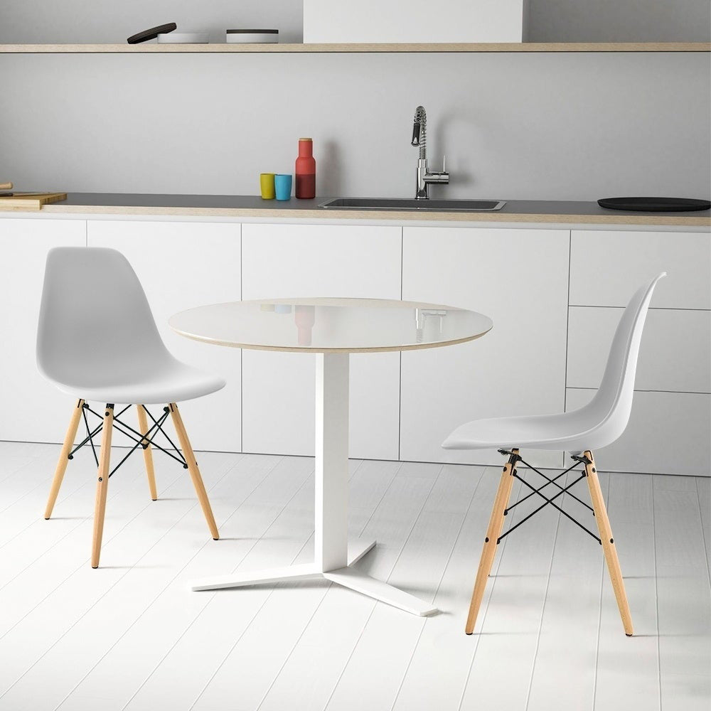 Loft Home Best Value Chairs Collection - Minimalist white chairs with natural wooden legs, blending modern design and affordability for dining or kitchen spaces