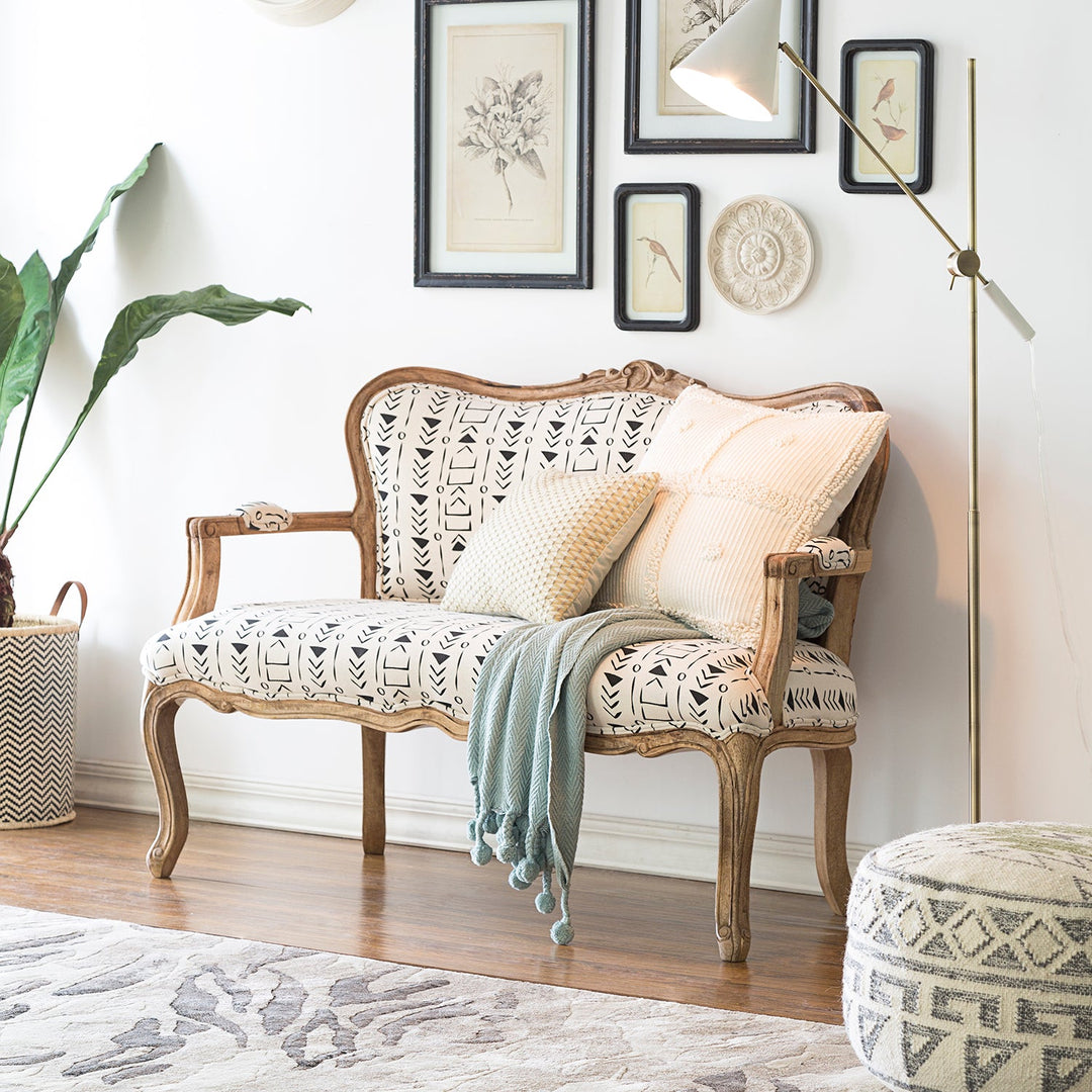 Loft Home Best Value Sofas Collection - Elegant two-seater upholstered in a patterned fabric with rustic wooden frame, perfect for cozy and affordable living room setups.
