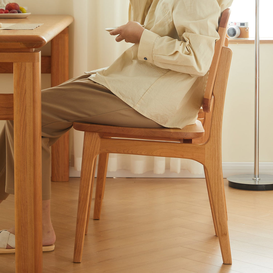 Loft Home wooden dining chair from the Chairs on Sale collection, featuring a sleek and ergonomic design for comfortable seating, enhancing dining spaces.