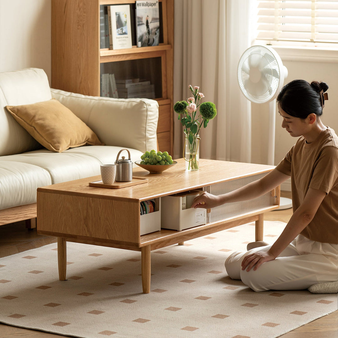 Modern wooden coffee table with concealed storage compartments, ideal for organizing magazines, remote controls, and living room essentials while enhancing a minimalist decor.