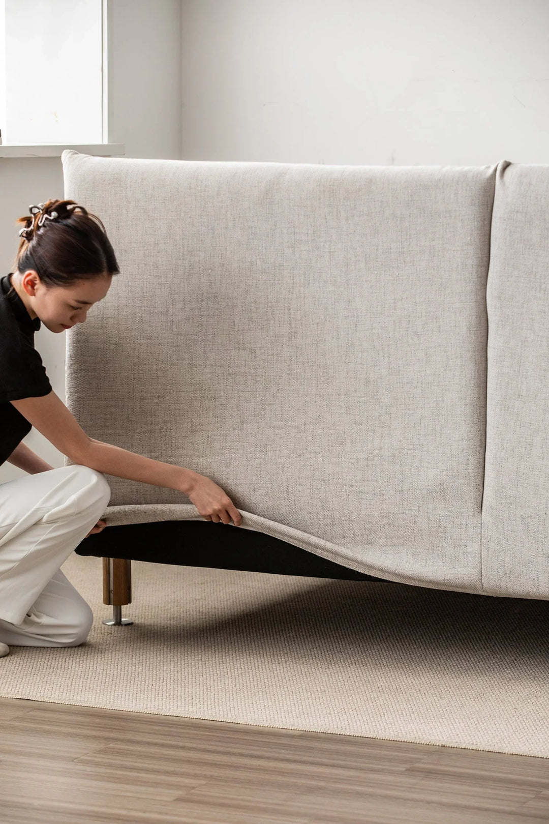 Loft Home fabric bed frame with removable cover design, styled with soft upholstery, enhancing easy maintenance and a clean bedroom setting.