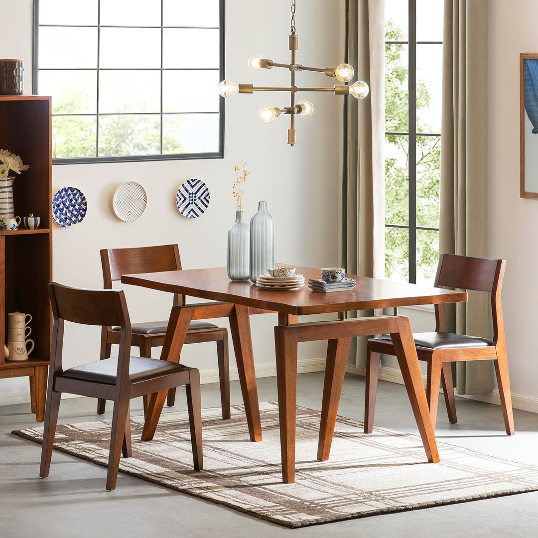 Loft Home Dining Room Chairs Collection - Sleek wooden dining chairs with a minimalist design, perfectly complementing a warm and elegant dining table setup