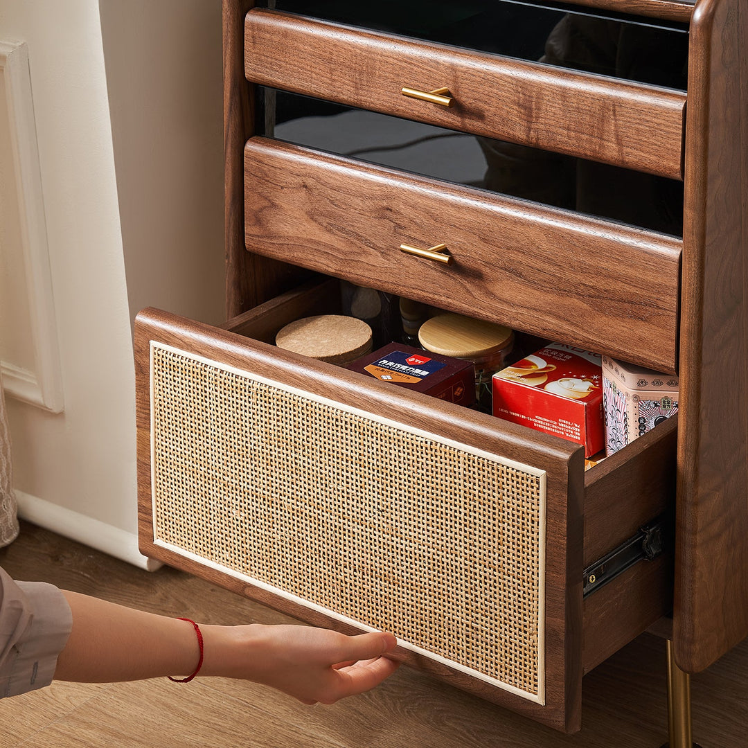 Walnut wood drawer cabinet featuring rattan weave front and gold handles, perfect for stylish and practical home storage.