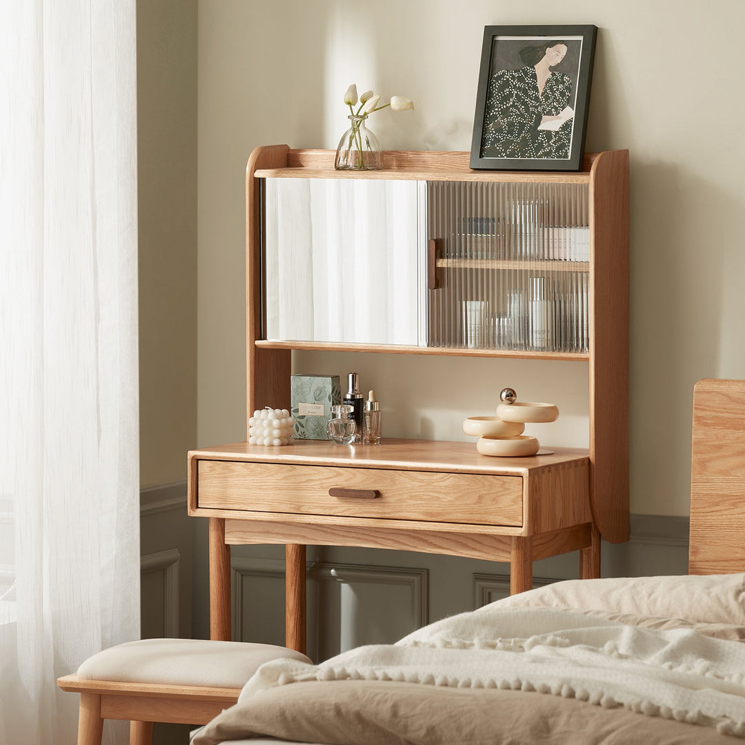 Elegant wooden dressing table with a sliding mirror and spacious shelves, perfect for organizing beauty essentials and enhancing bedroom aesthetics.