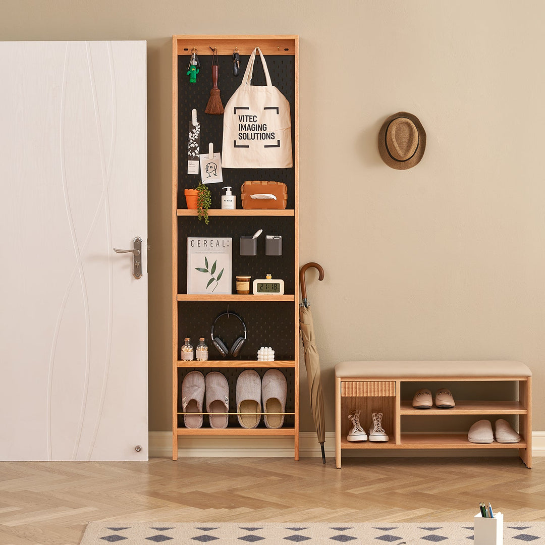 Loft Home entryway storage solution featuring a slim wooden shelving unit and bench, styled with functional organizers and neutral decor, enhancing practical and stylish home entrances.