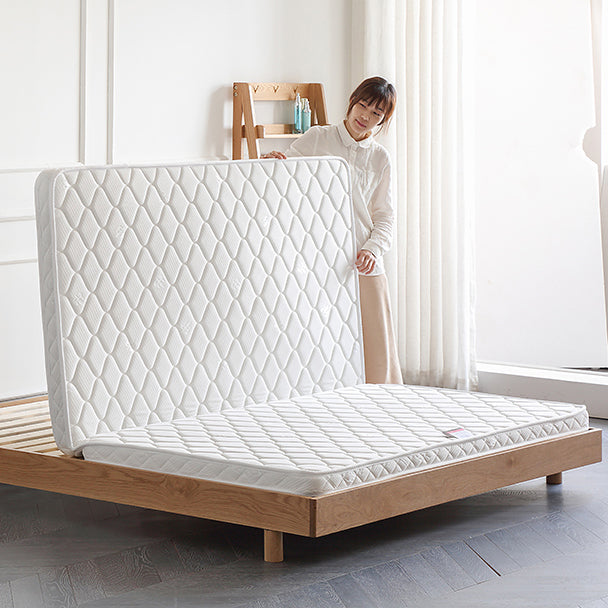 Foldable mattress in a sleek diamond-quilted design, offering compact storage and versatile comfort, ideal for modern living spaces.