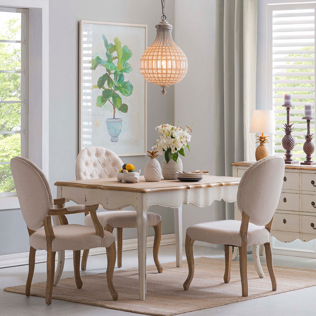 Charming vintage-style dining furniture set with elegant tufted chairs and a rustic wooden table, creating a cozy and sophisticated dining room ambiance.