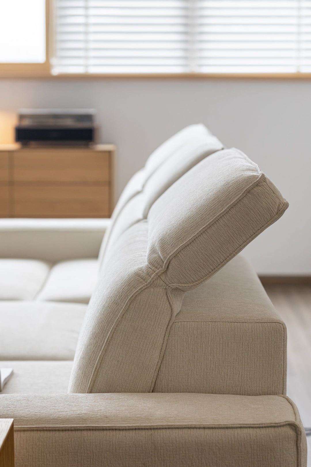 Height-adjustable sofa with adjustable headrest, designed for comfortable support in Singapore homes, HDB flats, and condos.