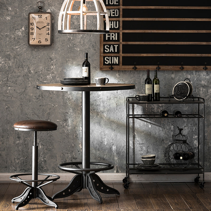 Loft Home Industrial Style Collection - rustic metal and wood bar table set with vintage decor in an urban industrial interior