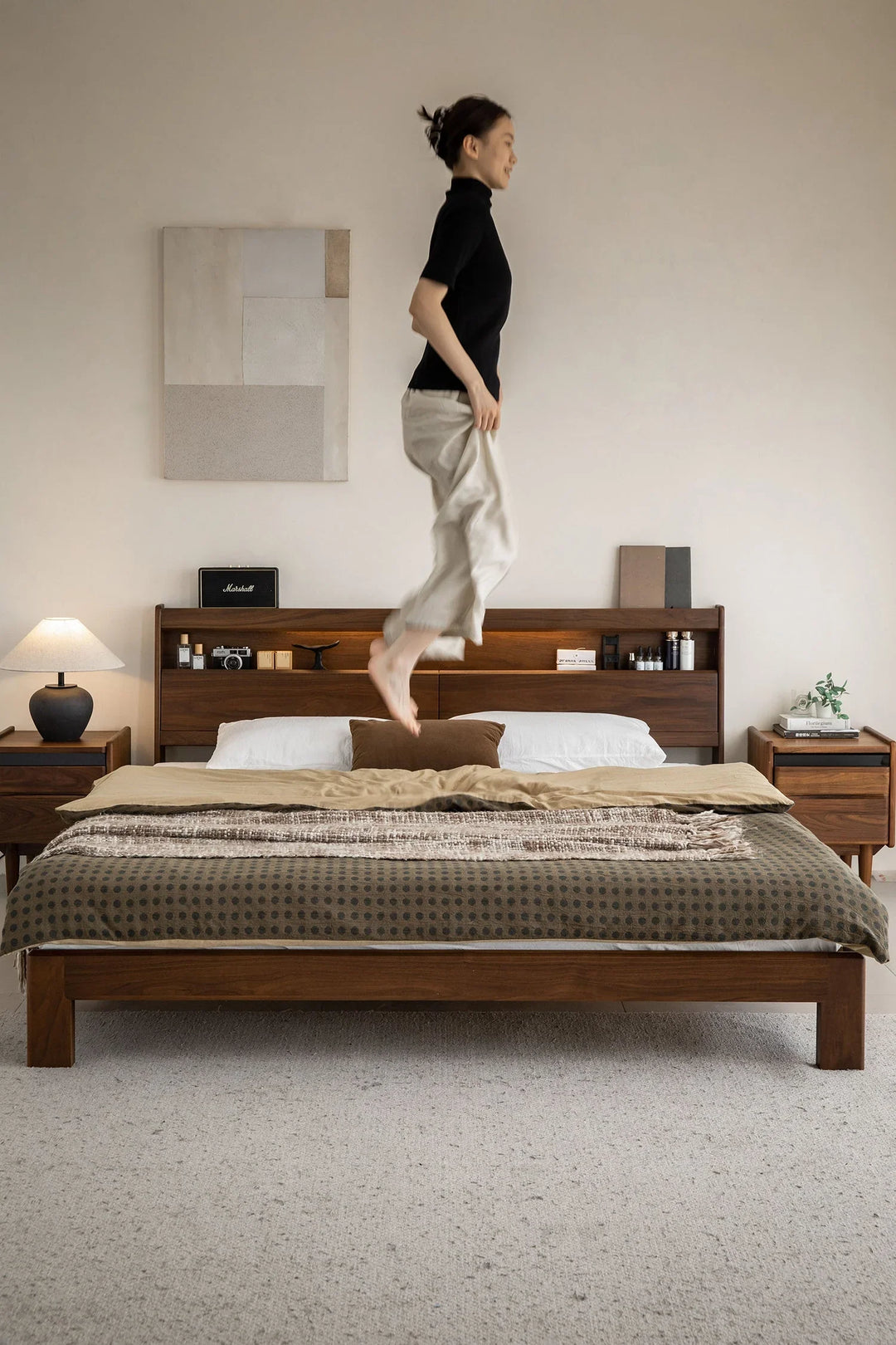 Loft Home Japandi wooden bed frame with clean lines and warm tones, styled with layered bedding, enhancing a calm and minimalist bedroom setting.