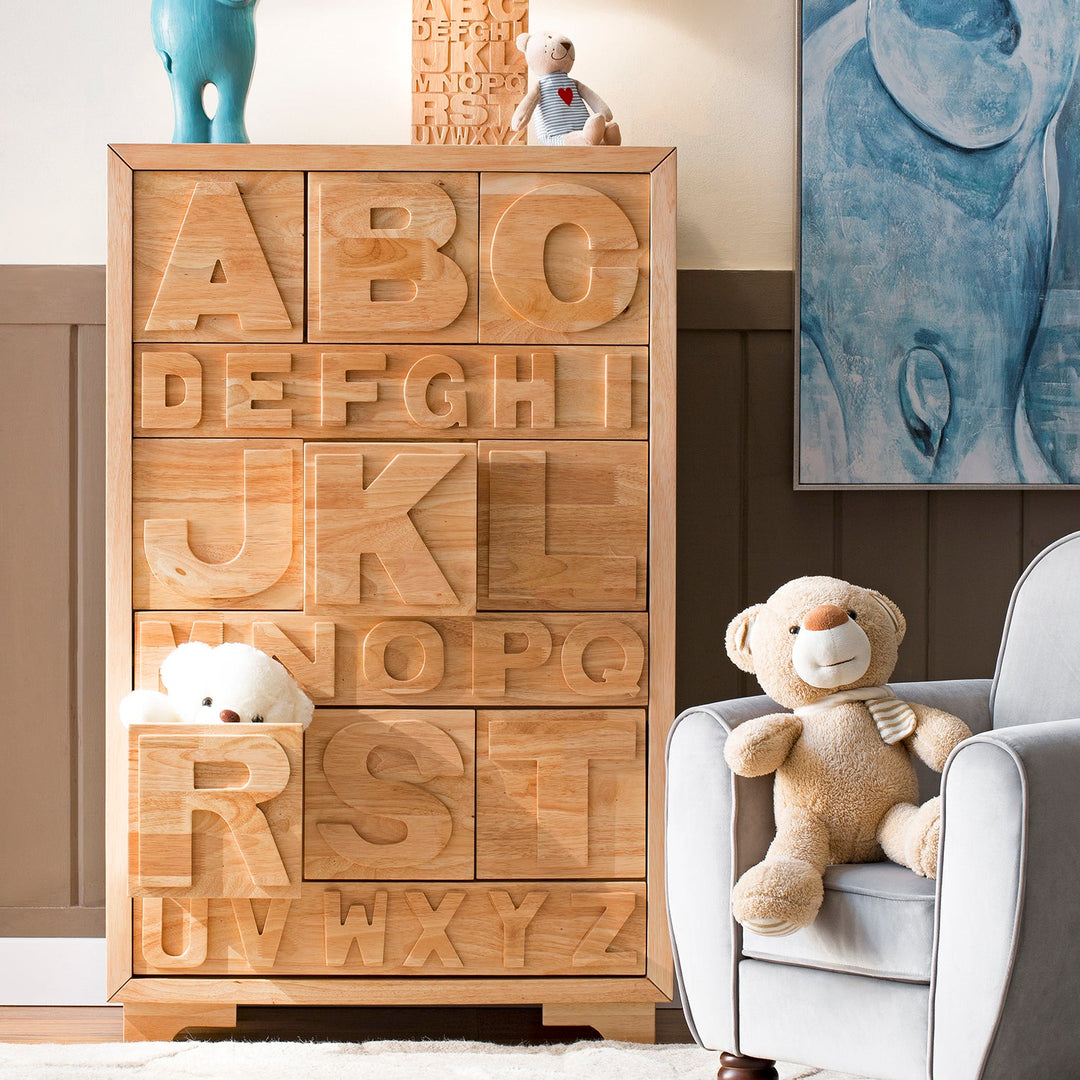 Loft Home Kids Room Storages Collection featuring a playful wooden cabinet with alphabet carvings, styled with plush toys, enhancing a fun and organized space.