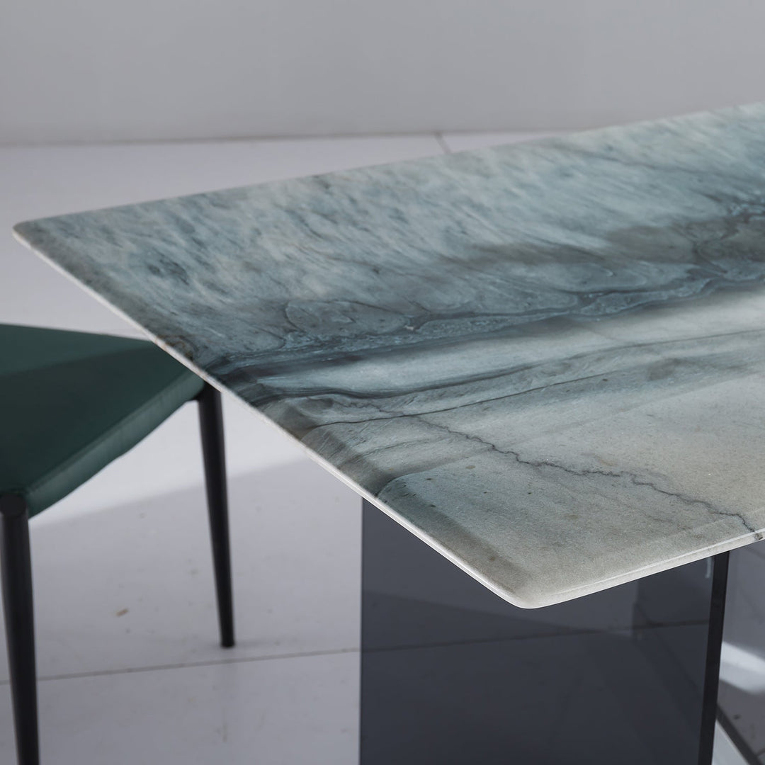 "Loft Home luxury stone dining table with a stunning green marble-patterned top, showcasing an elegant and contemporary design for upscale interiors.