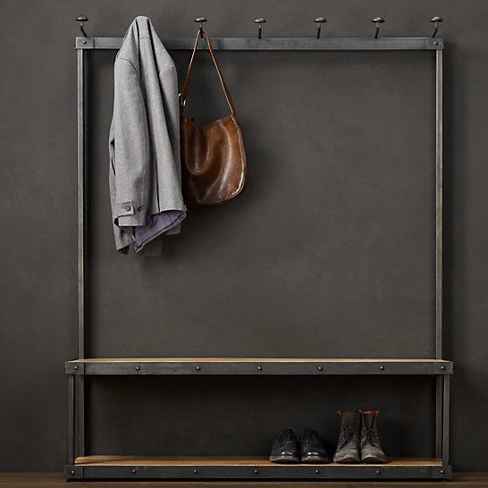 Minimalist metal clothes hanger with wooden shelves, ideal for hanging coats and organizing shoes, adding a sleek industrial touch to modern interiors.