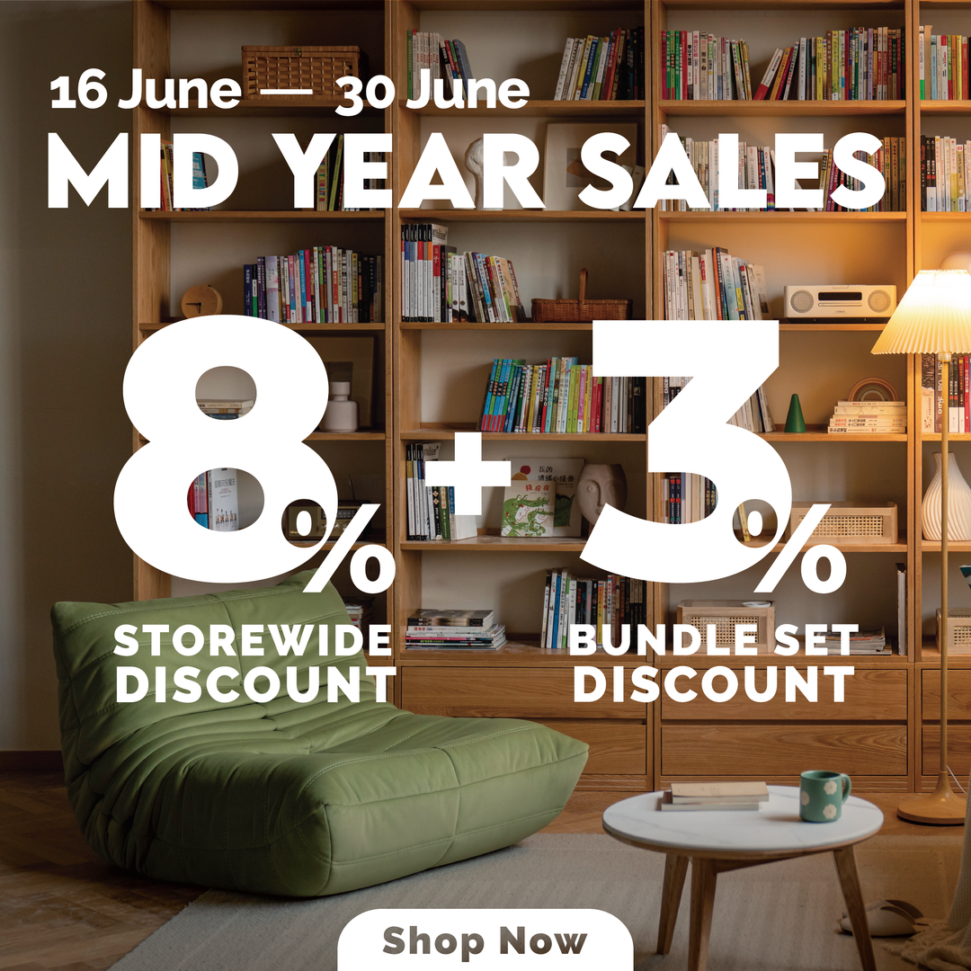 Mid-Year Sale banner featuring a cozy reading scene with bookshelf, green lounge chair, and beige sofa, highlighting 8% storewide and 3% bundle discount at Loft Home.