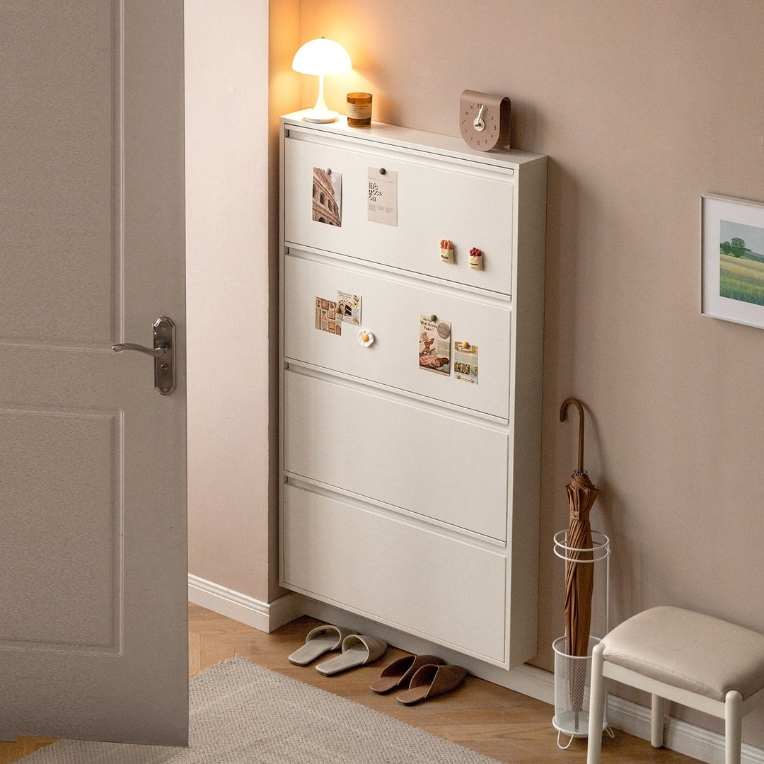 Compact white outdoor cabinet with magnetic surface, ideal for shoe storage and entryway organization, blending functionality with minimalist design.