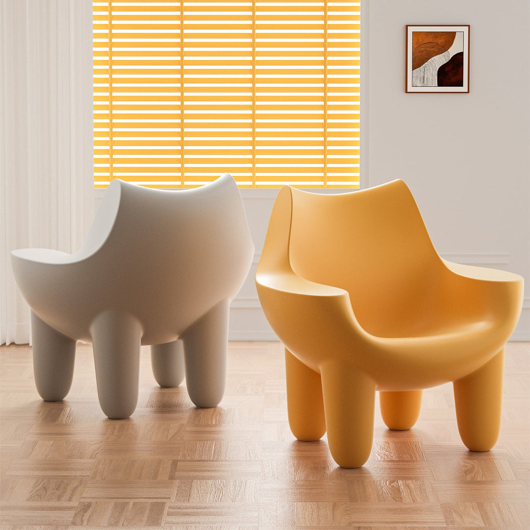 Loft Home plastic sofa chairs in bold yellow and white, featuring a sculptural design, perfect for modern and playful interiors in the Plastic Sofa Chairs collection.