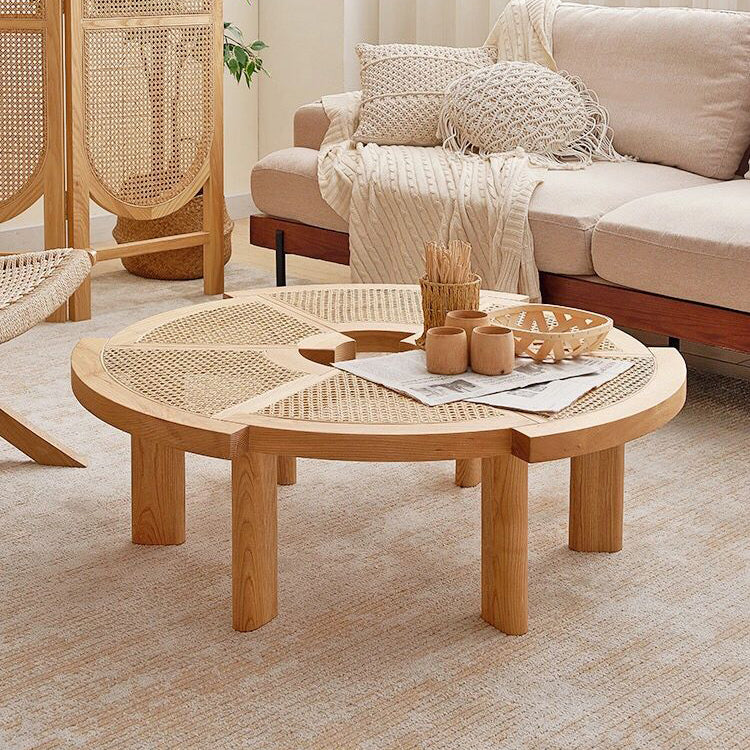 Loft Home Rattan Tables collection, featuring a round wood and woven design, adds natural charm and texture to bohemian or minimalist living spaces.