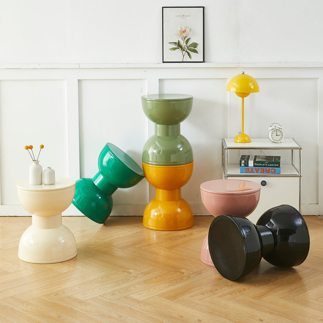 Playful round side tables in vibrant colors, featuring stackable designs for versatile use, enhancing modern and creative interiors.