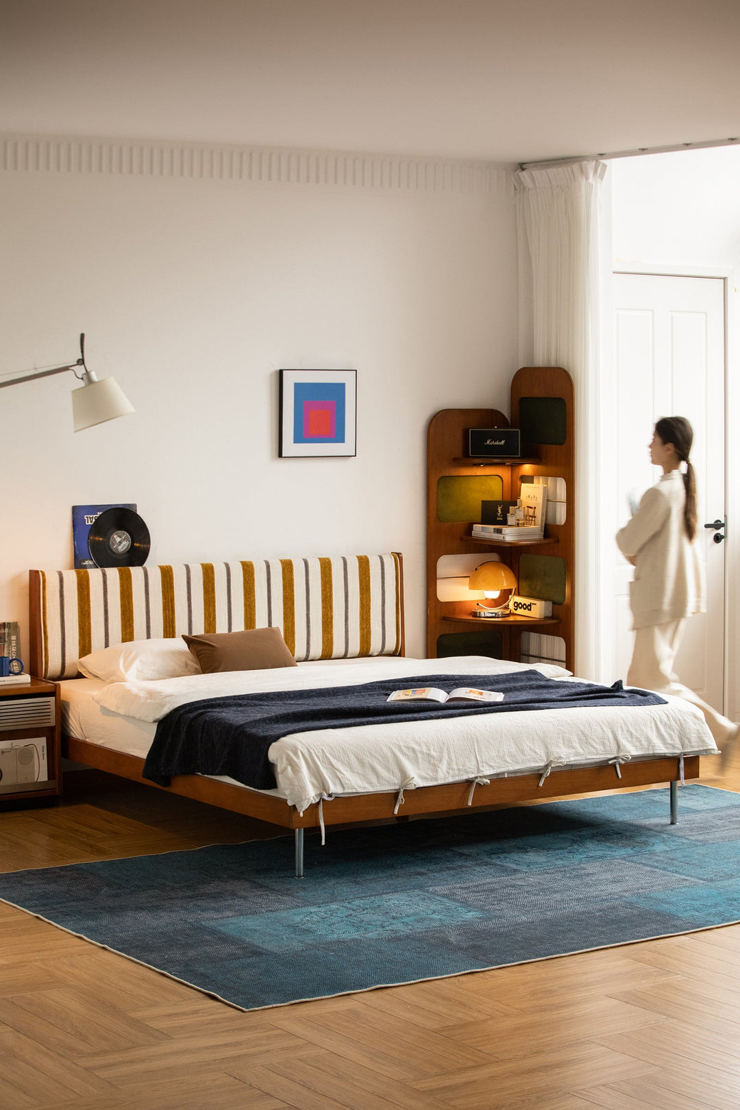 Minimalist wooden bed frame styled in a calm modern bedroom, featuring clean lines and comfortable design for refined Singapore home living.