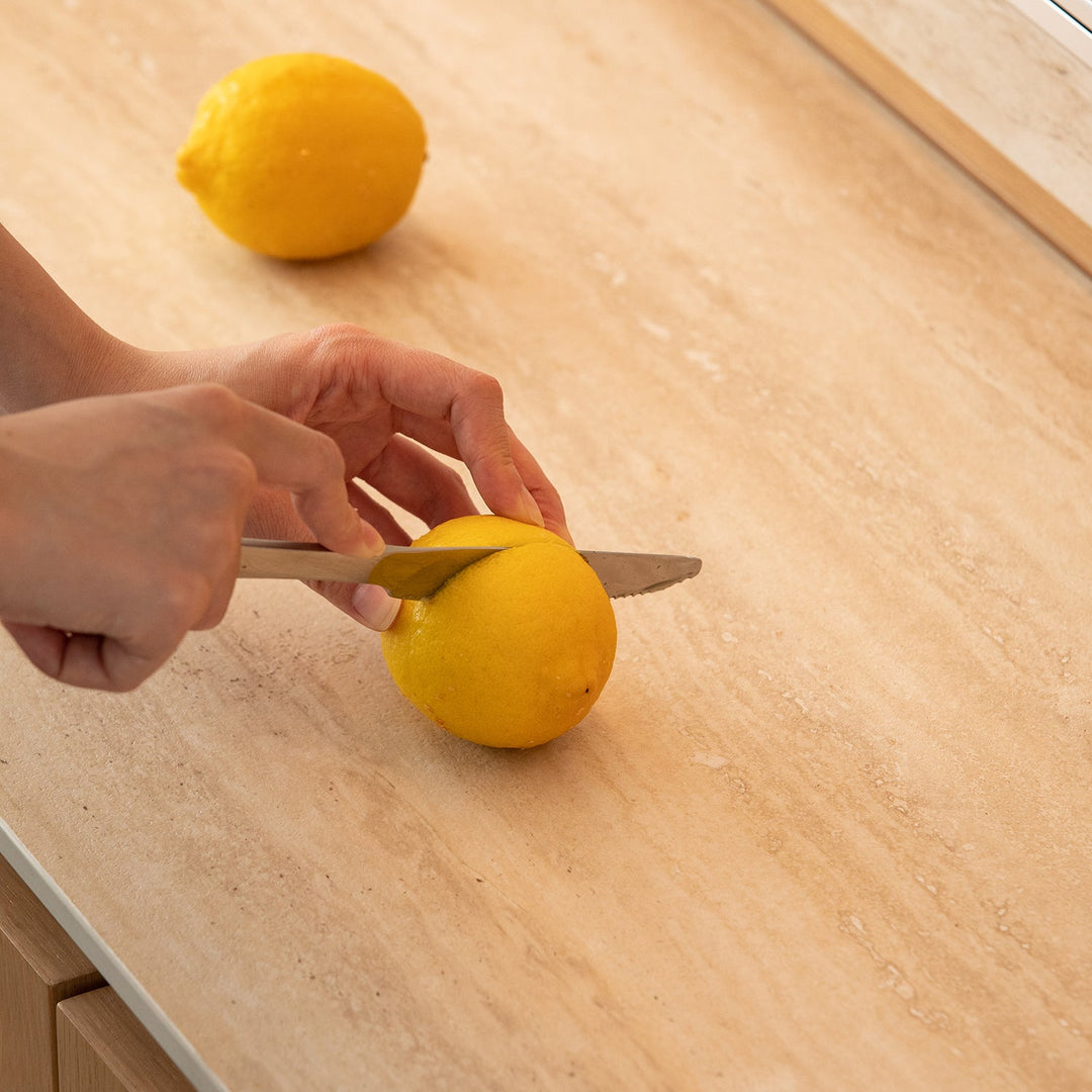 Sintered stone furniture surface with durable, knife-resistant texture, designed for hygienic use and modern living spaces by Loft Home.