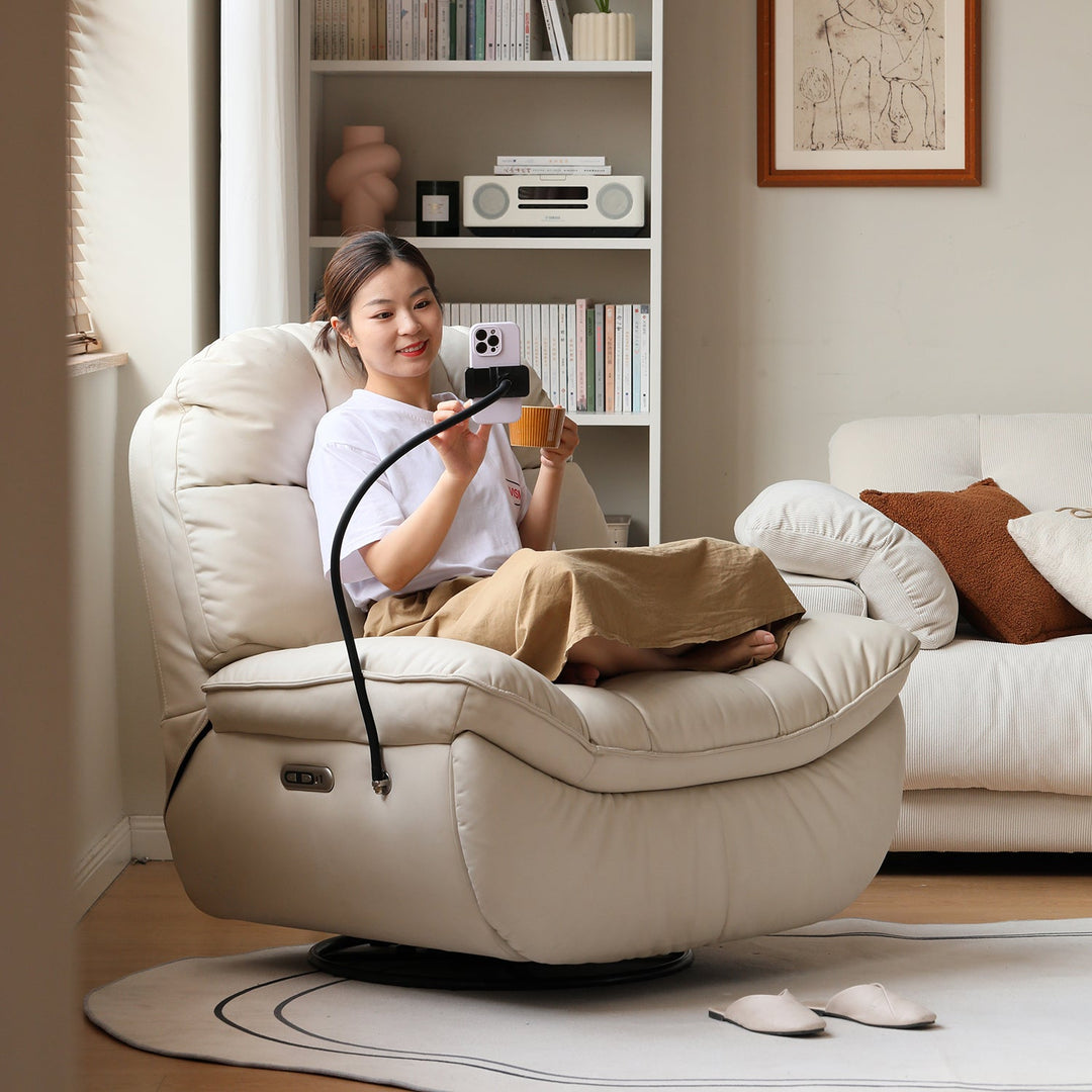 Loft Home reclining sofa in cream leather finish with built-in power point and USB port, providing comfort and modern functionality, perfect for cozy living spaces.