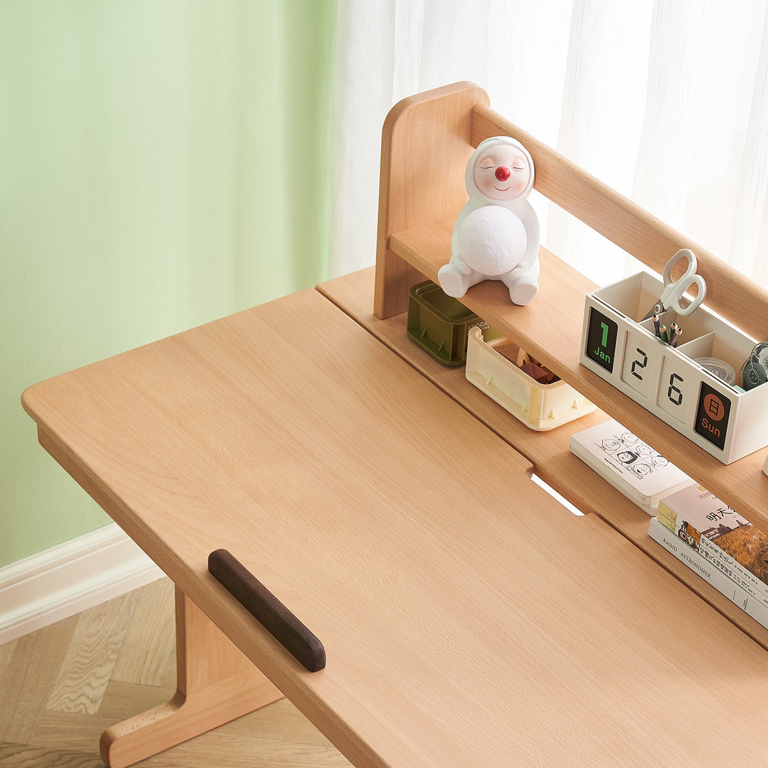 Wooden study table with an integrated shelf, offering organized storage for stationery and books, ideal for enhancing productivity in compact spaces.