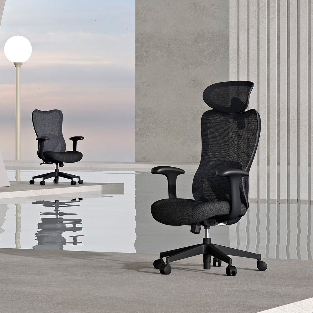 Modern black swivel office chair with adjustable headrest, breathable mesh back, and sturdy rolling base, enhancing comfort and mobility for professional workspaces.